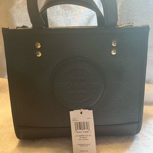 Dempsey Tote 22    
With Coach Patch- rarely used - perfect condition